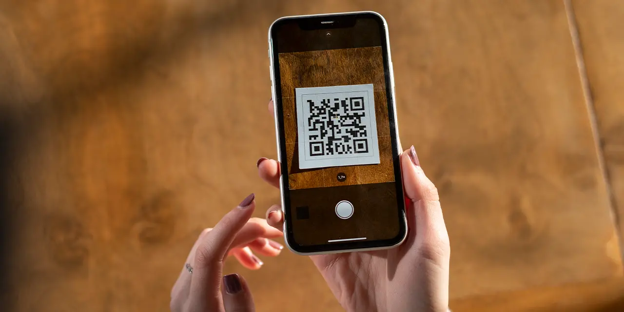 Professional using the QR Code feature to access information